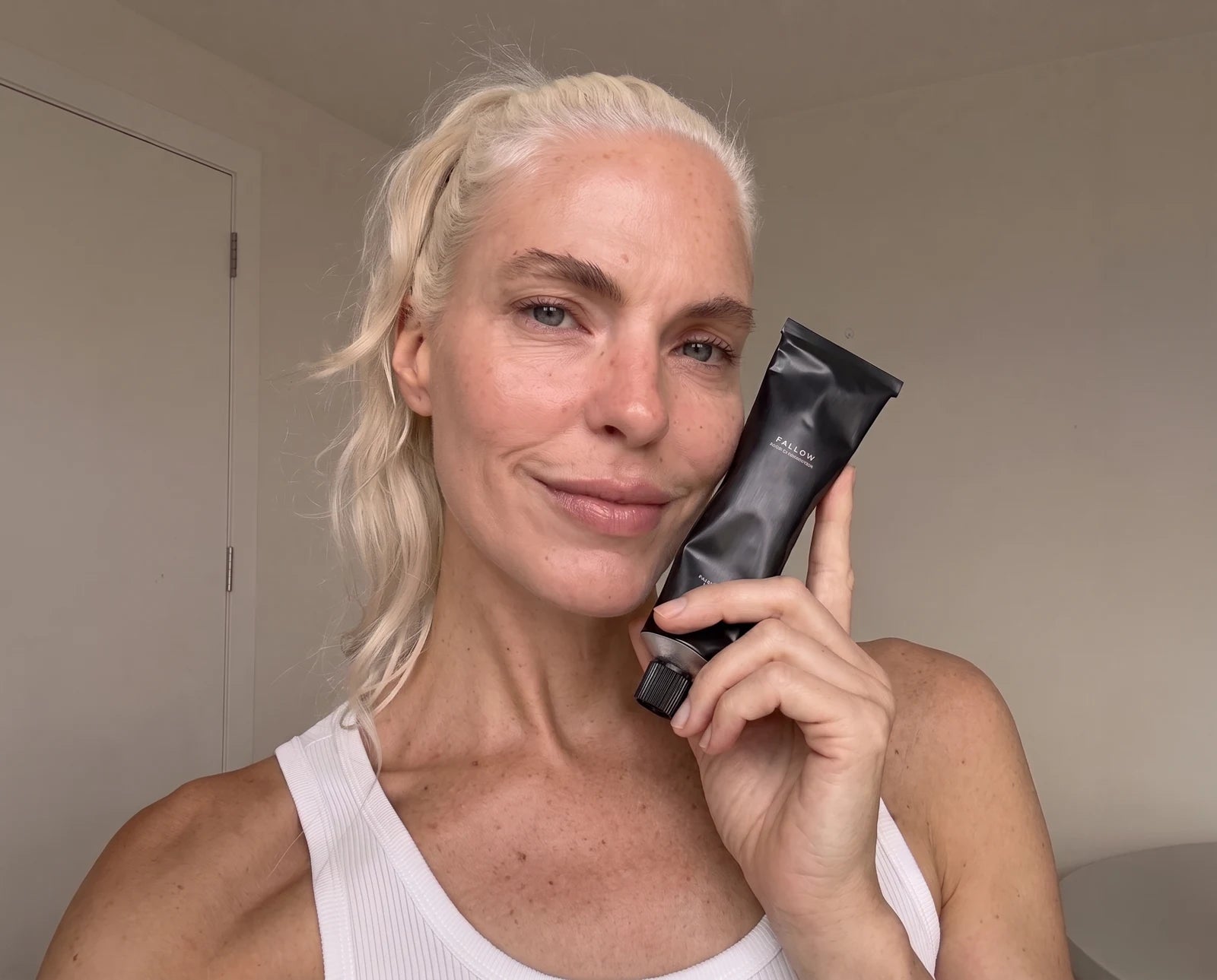 Applying Fallow moisturizer